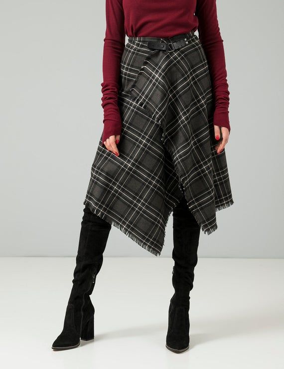 Get pretty in plaid this season in our tartan wrap around skirt. Excellent to pair with a business white shirt, simple slick turtleneck sweater or oversize button down cardigan.Suitable for many looks and occasions, very easy and stylish item in your wardrobe. Will stay there for years!Fits sz.S, M but can be easily readjusted with a buckle,80% lightweight wool, 20% acrylicModel's height 179 cmFind more on www.kozzachka.comInstagram: Kozzachka for more inspiration Casual Plaid Skirt For Winter, Chic Plaid Skirt For Workwear, Casual Plaid Skirt For Fall, Trendy Plaid Skirt For Winter, Asymmetrical Skirt For Winter Workwear, Plaid Skirt For Fall Workwear, Trendy Plaid Skirt For Fall, Casual Plaid Skirt For Work, Plaid Bottoms For Winter Workwear