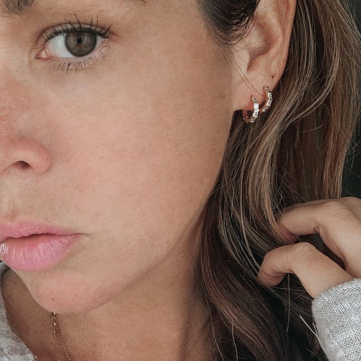 Our Isla Hoops are your new favorite tiny hoops! They are so sparkly and unique. They're minimalist + chic, and look great adorned with other earrings if you have multiple piercings!FEATURES Cubic zirconia 16k gold plated or rhodium (silver) hoops Nickel-free You will receive two earrings Dainty Rose Gold Tarnish-resistant Huggie Earrings, Rose Gold Tarnish-resistant Dainty Huggie Earrings, Dainty Cubic Zirconia Ear Cuff For Everyday, Dainty Rose Gold Hypoallergenic Huggie Earrings, Everyday Cubic Zirconia Huggie Ear Cuff, Rose Gold Cubic Zirconia Small Hoop Huggie Earrings, Dainty Rose Gold Hoop Earrings With Cubic Zirconia, Dainty Rose Gold Cubic Zirconia Huggie Earrings, Rose Gold Tarnish-resistant Cartilage Earrings For Everyday