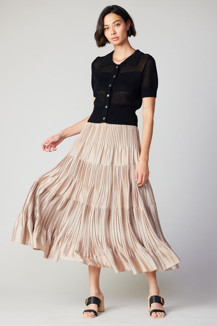 This satin-like skirt exudes class and feminity in an ultra-pleated design. Accented by a elastic waistband, it’s a daring way to make a statement for dressed-up moments. •Elastic waistband•Multi layer pleating •Tiered styling Item Number 2350194 100% Polyester Tiered Midi Skirt, Print Trends, Vacation Dresses, Sweater Sale, Trending Dresses, Sweater Blouse, Long Sweaters, Item Number, Short Tops