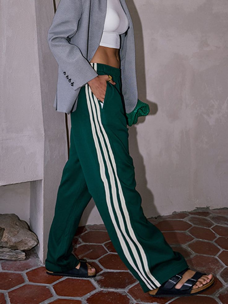 Casual Striped Patchwork Pants Affordable Adidas Sporty Pants, Adidas Womens Sweats, Green Side Stripe Pants For Streetwear, Green Pants With Side Stripes For Streetwear, Green Sweatpants With Side Stripes For Streetwear, Green Streetwear Pants With Side Stripes, Sporty Green Straight Pants, Green Bottoms With Side Stripes For Streetwear, Green Athleisure Bottoms With Side Stripes