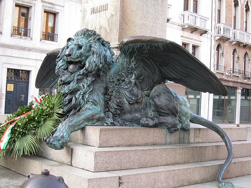 a statue of a lion with wings on its back