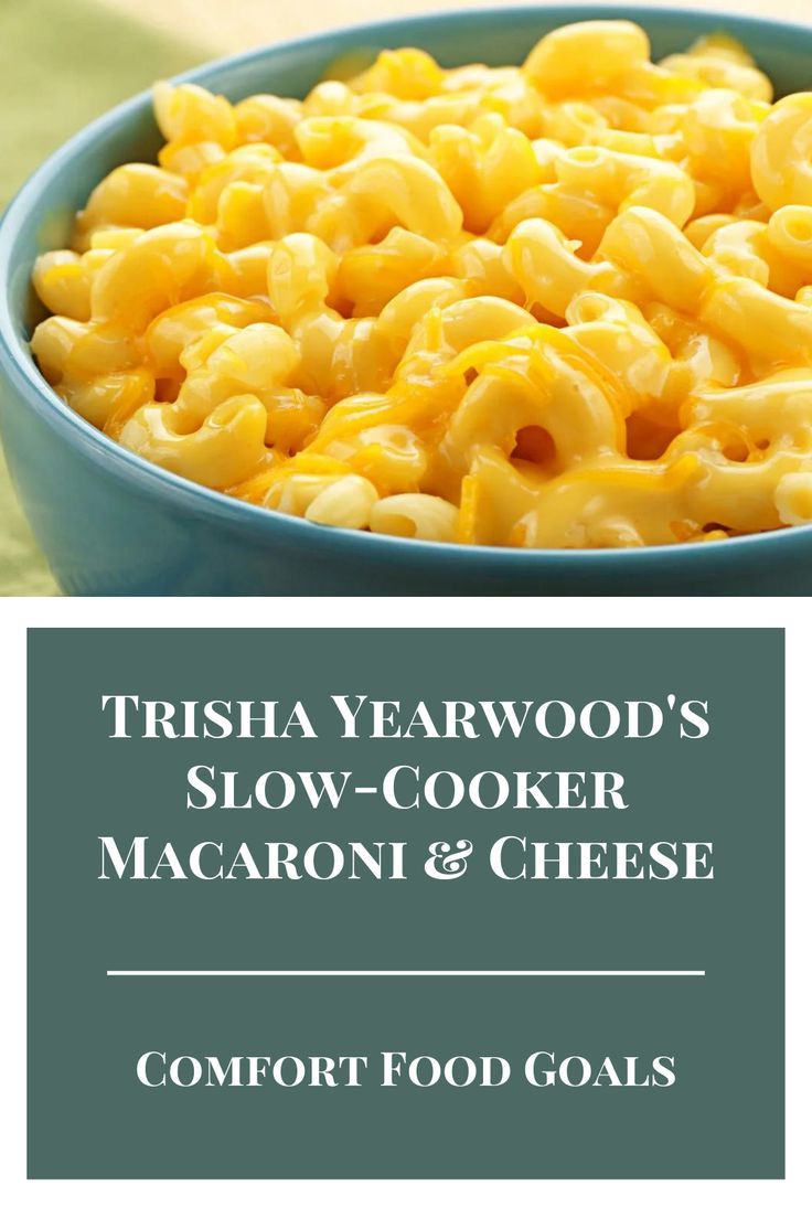 a blue bowl filled with macaroni and cheese next to the words trisha yearwood's slow - cooker macaron & cheese