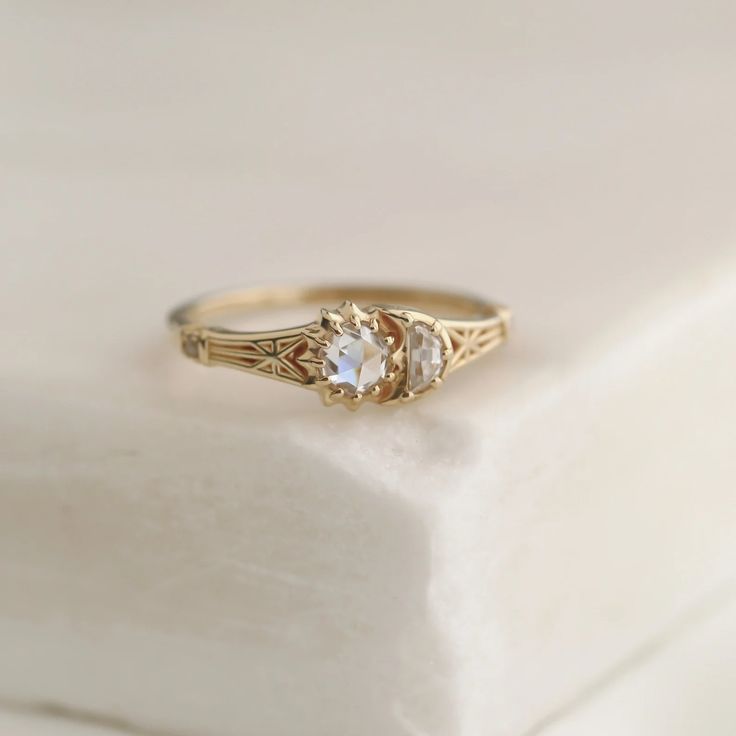 a close up of a ring on a white surface