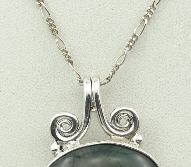 "Gorgeous green moss agate cabochon in a vintage sterling silver pendant. Marked \"925\". 18\" inch sterling silver chain included! A wonderful addition to your personal jewelry collection. FREE Domestic Shipping! Details: Sterling Silver: (as shown in photo) Moss Agate: cabochon Approximate Pendant Dimensions: 1 1/4 inch x 1 inch Chain Length: 18 inches Total Weight: 12.7 grams FREE Domestic Shipping by USPS Priority Mail Signature Confirmation and includes insurance. If the item is to be shipp Nickel-free Moss Agate Silver Jewelry, Nickel-free Silver Moss Agate Jewelry, Silver Moss Agate Jewelry With Cabochon, Silver Moss Agate Cabochon Jewelry, Moss Agate Cabochon Pendant Necklace, Mail Signature, Personal Jewelry, Green Moss Agate, Blue Sodalite