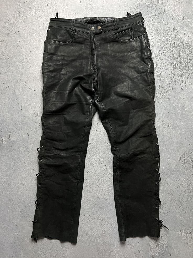 Genuine Real Leather Highway 1 Pant Vintage Rock Punk Racing Size Men's / US 32 / EU 48 Color Black Condition Gently Used vintage leather pant solid piece high quality leather The material is pleasant to the body. In a good condition. Fast sending! Size fits M (see measurements) Condition : 8/10 Length - 102 cm Waist - 43 cm Inseam - 79 cm Leg Opening - 20 cm Front Rise - 29 cm - FOLLOW MY STORE - SEE MY OTHER ITEMS Fitted Leather Gothic Pants, Punk Leather Pants For Biker Events, Gothic Black Leather Pants With Belt Loops, Black Gothic Leather Pants For Streetwear, Gothic Black Leather Pants, Black Gothic Leather Pants, Punk Leather Pants For Streetwear, Biker Style Leather Pants For Streetwear, Black Punk Leather Pants For Biker Events