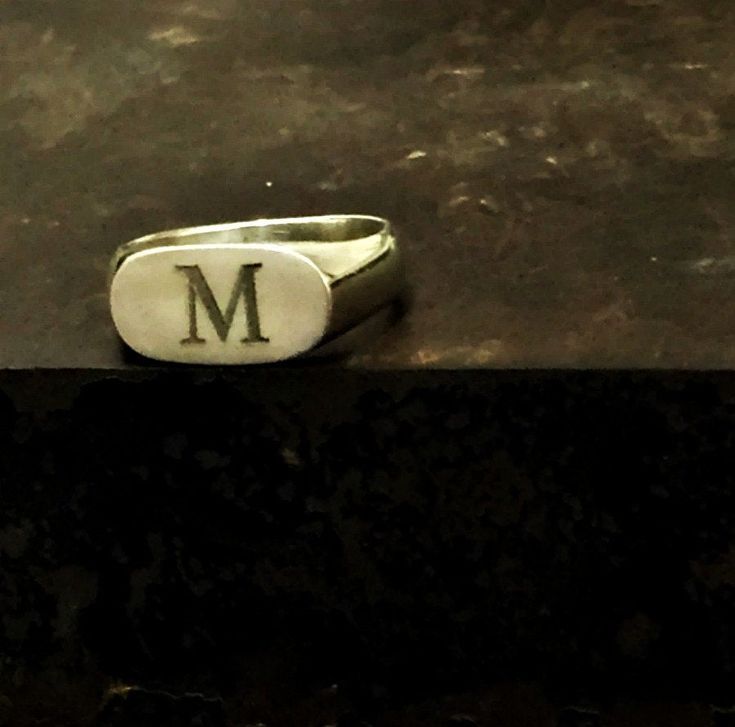 Sterling silver signet ring. delicate oval shape that can be warn on the pinky or any other finger. You can personalized it by adding your initials or your first name letter. Please write the letter or letters you want at note from buyer at checkout. Here is the listing for the plain version: https://www.etsy.com/il-en/listing/214276980/oval-signet-ring-women-silver-ring-women?ref=shop_home_active_1 Silver Initial Ring With Oval Shape, Formal Oval Engraved Stamped Ring, Sterling Silver Oval Initial Ring For Gift, Silver Signet Ring With Initials, Silver Oval Signet Ring With Initials, Personalized Silver Oval Signet Ring, Oval Silver Signet Ring With Initials, Silver Oval Initial Ring Gift, Silver Oval Initial Ring For Gift