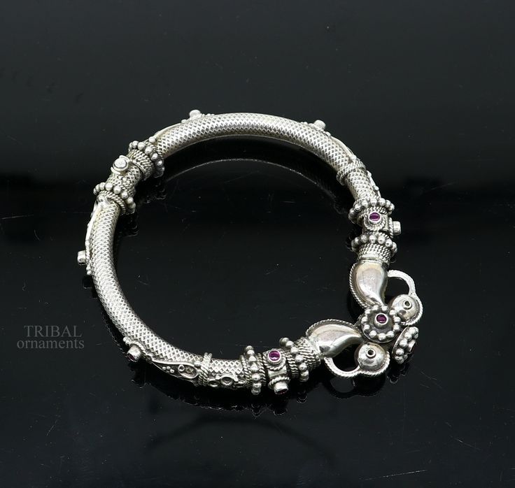 Amazing handcrafted chitai or kandrai work 925 sterling silver vintage design custom made oxidized silver personalized unisex gifting jewelry from India. Metal-925 sterling silver. Item type-Bangle /bracelet/ Kada. Weight-42.390 grams. Size-2-6 (2.37 inches inner diameter)We can easily wear this bangle by using locking system. Width-0.6 centimeters(maximum-1.0 mm) stamped- 925. Finish-Oxidized. Makes excellent gifting for birthday, mother's day, father's day, Christmas day,valentinesday, wedding, anniversary gifts Handmade Toe Ring Jewelry For Diwali, Festive Jewelry With Oxidized Finish, Festive Oxidized Round Jewelry, Traditional Bracelet With Intricate Design, Festive Round Oxidized Jewelry, Silver Jewelry For Ceremonial Diwali Occasion, Traditional Intricate Bracelet Jewelry, Silver Ceremonial Jewelry For Diwali, Silver Jewelry For Ceremonial Occasions During Diwali