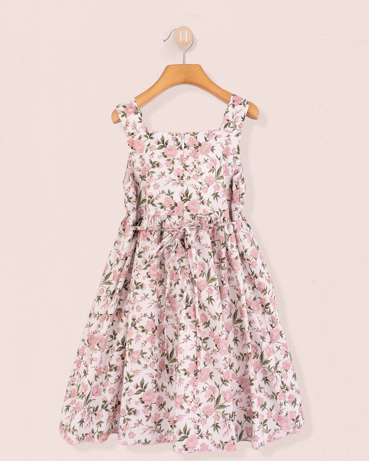 Elegance and Charm in a Beautiful Blush Rosebud Print. Portofino is a fantastic summer dress that girls just love to twirl around in. The dress has hand-made pintucks along the bodice, a zipper closure and fine sash suitable for older girls. 100% Liberty of London Cotton. Fully Lined with Fine Petticoat. Delicate Machine Wash Cold, Tumble Dry low, Cool Iron, Dry Clean Garden Party Dress With Rose Print And Fitted Bodice, Fitted Bodice Rose Print Dress For Garden Party, Spring Dress With Rose Detail And Fitted Bodice, Spring Dresses With Rose Detail And Fitted Bodice, A-line Rose Print Dresses For Garden Party, Pink Ruched Bodice Dress For Garden Party, Pink Dress For Garden Party With Ruched Bodice, Pink Dress With Ruched Bodice For Garden Party, Boy Styles