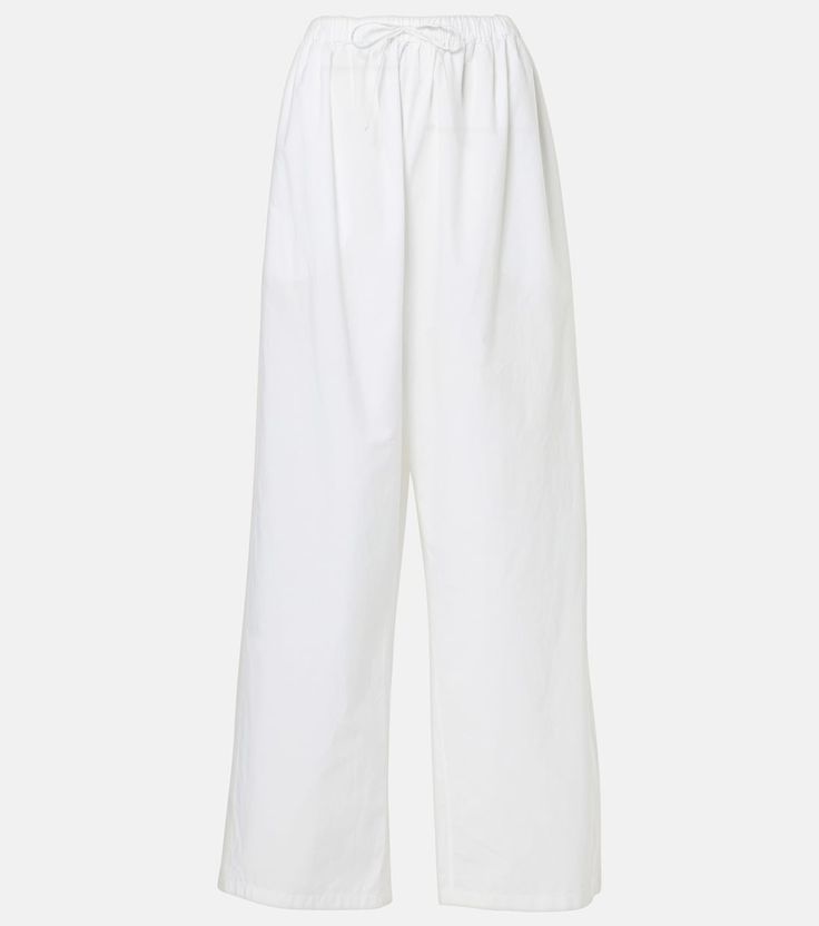 Hubert cotton wide-leg pants in white - The Row | Mytheresa Wide White Pants, Cotton Wide Leg Pants With Side Pockets For Loungewear, Chic Cotton Parachute Pants For Loungewear, Cotton Drawstring Pants With Straight Hem, Drawstring Cotton Pants With Straight Hem, Cotton Straight Pants For Daywear, Cotton Wide Leg Pants With Drawstring, Chic Cotton Wide Leg Pants With Elastic Waistband, Straight Cotton Pants For Daywear