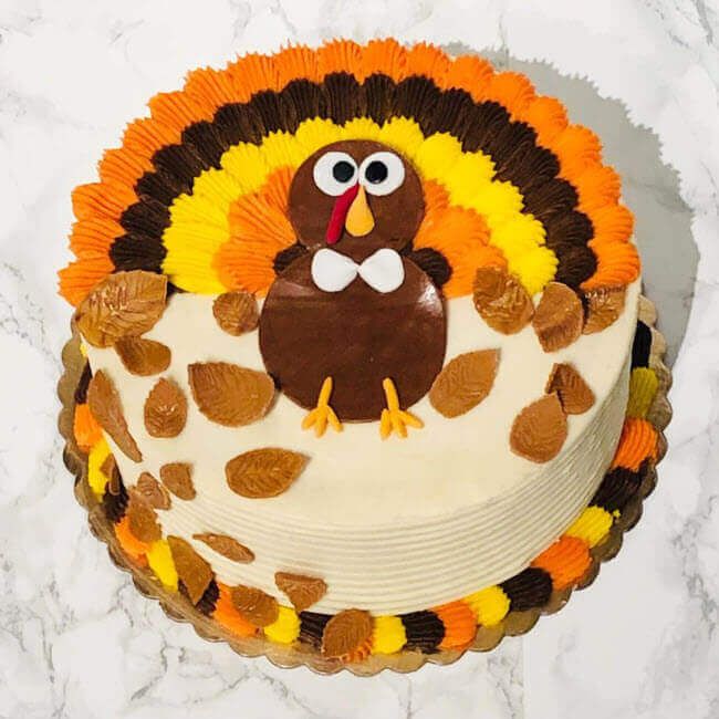 a decorated cake with a turkey on it