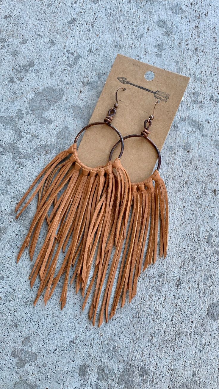 Brown Tassel Earrings For Festivals, Brown Fringe Tassel Earrings For Festivals, Brown Fringe Jewelry For Festivals, Brown Dangle Earrings With Tassels, Bohemian Brown Fringe Earrings, Brown Fringe Dangle Jewelry, Brown Fringe Tassel Dangle Earrings, Brown Fringe Dangle Tassel Earrings, Brown Dangle Tassel Earrings With Fringe