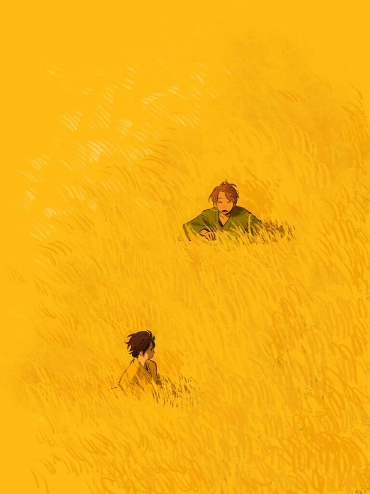 two people are in the tall grass looking at something