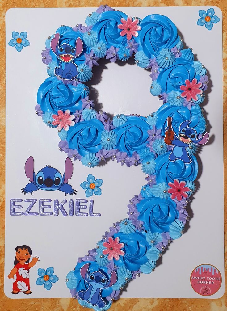 number cupcake, pull apart style, Lilo and stitch theme Lilo And Stitch Birthday Outfit Ideas, Diy Stitch Cake Ideas, Stitch Cupcake Cake Ideas, Lilo Birthday Party Ideas, Lilo And Stitch Pool Party Ideas, Stitch Cupcakes Ideas Birthday, Stitch Cake And Cupcakes, Stitch Birthday Snacks, Lilo And Stitch Birthday Cupcakes