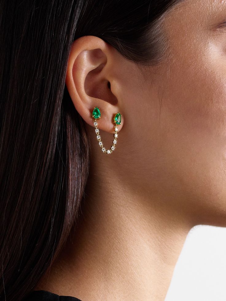 Anita Ko's single 'Loop' earring is meant for those with multiple piercings on one ear - the dainty, diamond-encrusted chain connects the individual studs together and drapes beautifully past the lobe. It's made from 18-karat gold and set with pear-shaped emeralds. Luxury Ear Cuff With Matching Earrings As Gift, Luxury Green Single Earring Jewelry, Green Luxury Single Earring Jewelry, Luxury Green Single Earring, Green Single Earring For Evening, Single Green Earring For Evening, Formal Pierced Fine Jewelry Ear Cuff, Formal Fine Jewelry Pierced Ear Cuff, Luxury Gift Ear Cuff