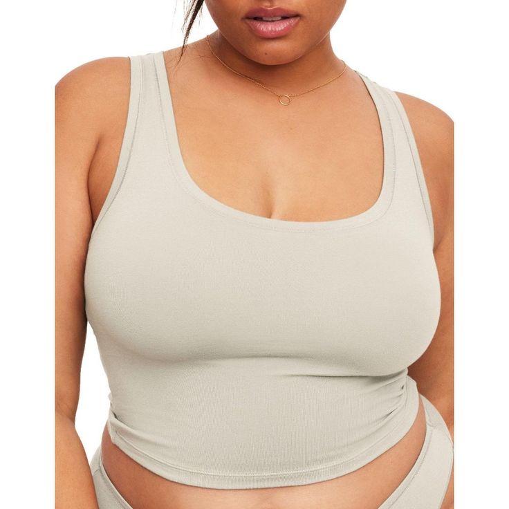 Our Jolene crop is crafted from natural stretch jersey cotton and comes in white, green, blue, black & gray—the perfect colors for a basic staple tank. Cheap Moisture-wicking Crew Neck Tank Top, Everyday Scoop Neck Seamless Crop Top, Basic Seamless Tank Top For Loungewear, Everyday Solid Scoop Neck Crop Top, Everyday Solid Color Scoop Neck Crop Top, Basic Everyday Crop Top Tank, Seamless Cropped Tank Top, Seamless Crop Top Tank For Loungewear, Seamless Medium Support Crop Tank Top