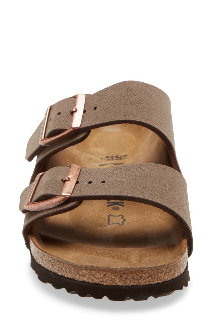 A slide sandal pairs Birko-Flor, a fabric with a leather-like finish, with a legendary footbed that mimics the shape of the foot with excellent support. Flat sole Adjustable straps with buckle closure Contoured cork footbed with arch support Synthetic upper/leather lining/synthetic sole Made in Germany Women's Shoes Brown Synthetic Slides With Cushioned Footbed, Brown Double Strap Casual Slides, Adjustable Slides With Leather Footbed, Adjustable Leather Footbed Slides, Brown Slides With Cushioned Footbed, Adjustable Brown Slides With Cushioned Footbed, Adjustable Brown Slides With Removable Insole, Brown Double Strap Slides With Textured Footbed, Brown Slide Footbed Sandals With Cork-bed Midsoles