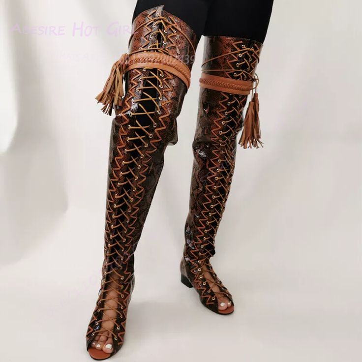 Boots are custom made and takes 3-5 weeks to arrive with custom sizing. 1-2 weeks without custom sizing Product Description: Step out in fierce style with these stunning faux snake lace-up boots! These boots feature a chic and trendy faux snakeskin texture, adding a touch of edgy sophistication to any outfit. The lace-up design ensures a secure and adjustable fit, while the durable construction promises long-lasting wear. But here's the best part: these boots are available with a custom sizing o Fitted Leather Boots With Lacing, Leather Boots With Lacing, Luxury Fitted Lace-up Boots, Thigh High Shoes, Long Boots Women, Women's Knee High Boots, Peep Toe Boots, Shoes Big, Bodysuit Tops