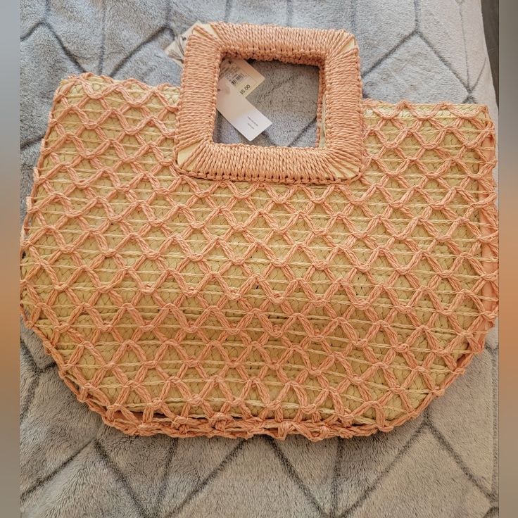 This Beautiful A New Day Handbag Is Perfect For Any Bohemian-Loving Woman. The Pink Woven Paper Exterior And Beige Handle/Strap Color Make For A Stunning Contrast. The Bag Is Small, Measuring 13 Inches In Width And Height, And 8 Inches In Depth, Making It Ideal For Carrying Just Your Essentials. The Bag Features An Open Closure And A Satchel/Top Handle Bag Style. The Lining Material Is Made Of Straw And Paper Straw, Giving It A Unique And Stylish Look. The Bag Is A Part Of The A New Day Product Spring Beach Hobo Bag With Top Handle, Casual Pink Rectangular Bag, Trendy Rectangular Hobo Bag For Beach Season, Spring Vacation Top Handle Hobo Bag, Spring Vacation Hobo Bag With Top Handle, Spring Woven Hobo Bag With Double Handle, Pink Rectangular Hobo Bag For Daily Use, Woven Hobo Bag With Double Handle For Spring, Spring Woven Double Handle Hobo Bag