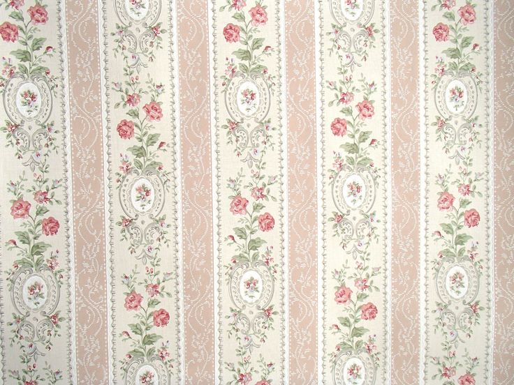 an old wallpaper with pink flowers and green leaves on white stripes in the background