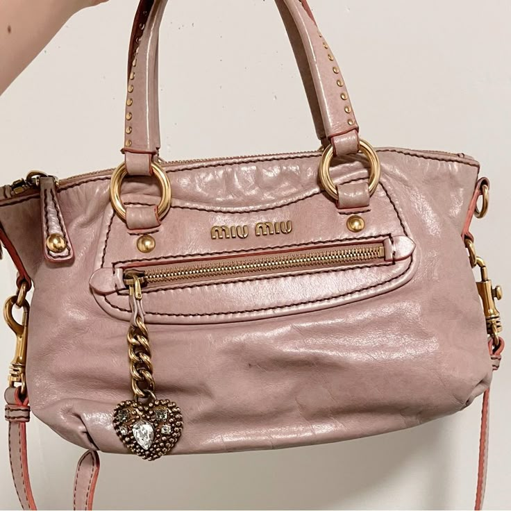 A Light Pink Miu Miu Handbag, Authentic, Adorned With A Heart-Shaped Crystal Pendant As Decoration, Super Cute Bags Miu Miu, Pink Miu Miu Bag, Purses And Bags Trendy, Muimui Bag, Cute Pink Bags, Vintage Miu Miu Bag, Handbags Y2k, Thrifted Bags, 90s Bags