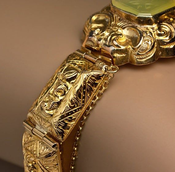 Luxury Carved Jewelry For Formal Occasions, Traditional Ceremonial Intaglio Jewelry, Antique Yellow Gold Bracelets With Intricate Design, Luxury Carved Jewelry For Weddings, Antique Engraved Yellow Gold Bracelet, Formal Yellow Gold Octagon Bracelets, Etched Yellow Gold Bracelet, Antique Gold Rectangular Bracelet, Antique Carved Yellow Gold Jewelry