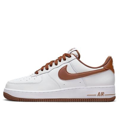 The Nike Air Force 1 '07 'Pecan' is a timeless classic that features a white leather base, chocolate brown accents on the tongue label, laces, lining, Swoosh, midsole branding, and rubber outsole. The sleek silhouette of this sneaker makes it perfect for any occasion. The inspiration behind this design comes from the Air Force 1 series, which has been a staple in the sneaker world since 1982. The combination of white and brown gives the sneaker a classic look, making it an ideal choice for those who want to stand out. (AF1/SNKR) Classic Nike Air Force 1 Low-top, Classic Nike Air Force 1 With Gum Sole, Classic Nike Air Force 1 With Rubber Sole, Nike Air Force 1 Classic Leather With Gum Sole, Classic Nike Air Force 1 With White Sole, White Nike Air Force 1 Leather Classic Style, Classic Leather Nike Air Force 1 With White Sole, Classic Leather Nike Air Force 1, Classic Brown Custom Sneakers For Streetwear