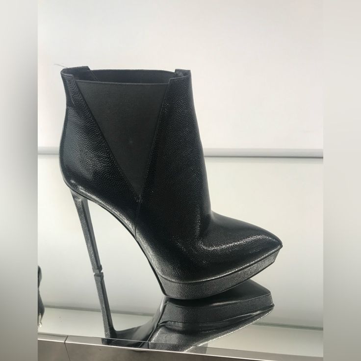 Stunning Saint Laurent High Heel Boot Original Sticker Price : $1250 Purchased For $750 Selling For $350 Or Best Offer Size 35 Worn No More Than 3 Times And In Good Health You Can Get Black Rubber Soles For The Bottom To Look Good As New Comes With Box As Always Feel Free To Ping With Any Questions :) Sleek Evening Boots With Leather Lining, Modern Evening Boots With Leather Lining, Evening Platform Heels In Calf Leather, Elegant Boots With 4-inch Heel For Night Out, Modern Leather-lined Boots For Evening, Luxury Calf Leather Heels For Evening, Luxury Boots With Padded Heel, Modern Calf Leather Heels For Party, Luxury Patent Leather Evening Boots