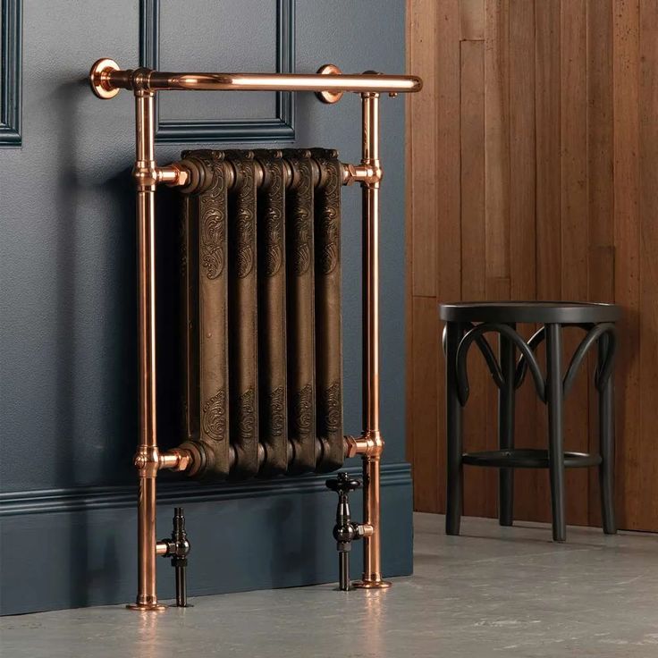 an old fashioned radiator in a blue room