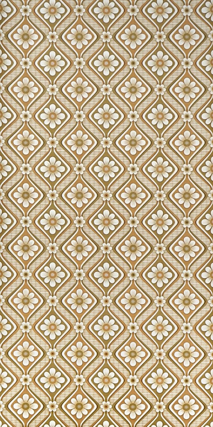 a brown and white rug with an intricate design