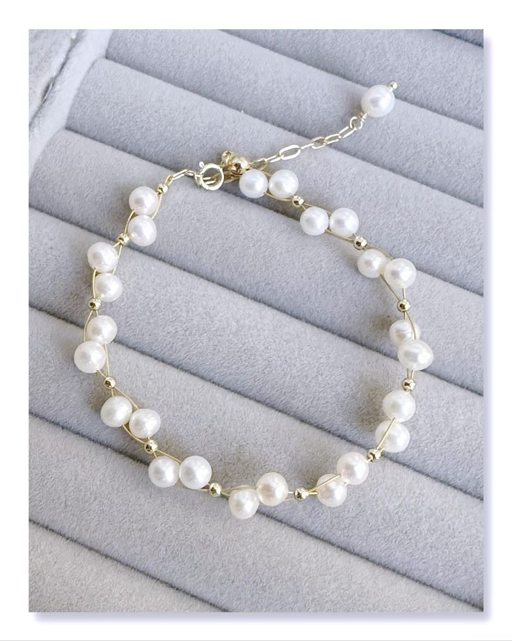 Dainty White Bracelets For Bridesmaid Gift, Elegant Bangle Jewelry For Bridesmaid Gift, White Feminine Bracelets For Wedding, Elegant Bangle Bracelets For Bridesmaid Gift, Elegant Bracelet Jewelry For Bridesmaid Gift, Elegant Bangle For Bridesmaid Gift, Pearl White Bracelet Jewelry As Bridesmaid Gift, White Beaded Bracelets For Bridesmaid Gift, Adjustable Pearl Bracelets For Bridesmaids