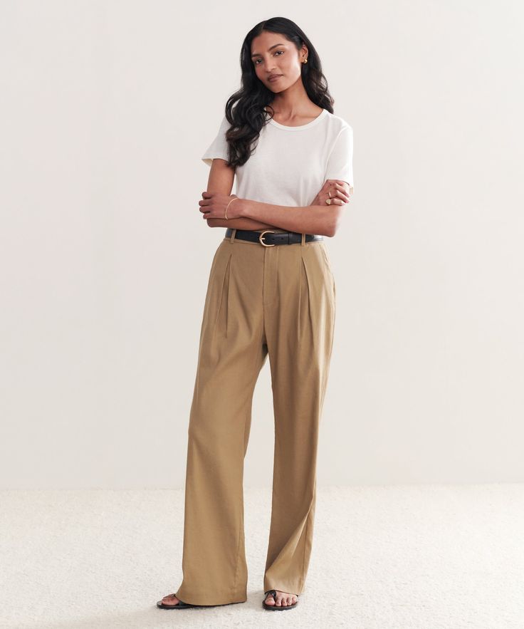 Riley Trouser Safari The perfect summer-ready trouser that features a lightweight feel. Meant to be worn with a relaxed fit for a breezy and effortless look. 50% linen, 47% viscose, 3% spandex. Made in Turkey. Features box pleat in the front. | Jenni Kayne Women's Riley Trouser Size 14 Effortless Relaxed Fit Straight Leg Pants, Versatile Relaxed Fit Tapered Leg Dress Pants, Effortless Straight Leg Bottoms For Workwear, Effortless Relaxed Fit Tapered Leg Pants, Versatile Tapered Leg Dress Pants In Relaxed Fit, Effortless Wide Leg Workwear Pants, Relaxed Straight Leg Work Pants, Effortless Wide Leg Straight Pants For Work, Effortless Straight Leg Pants For Workwear