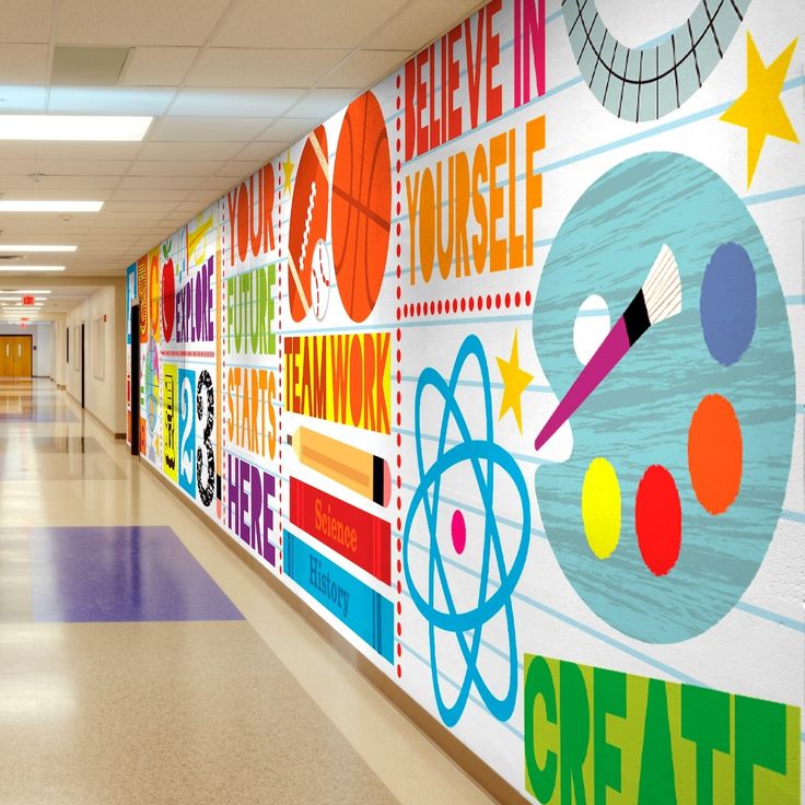 the hallway is decorated with colorful wallpapers and school related art on it's walls