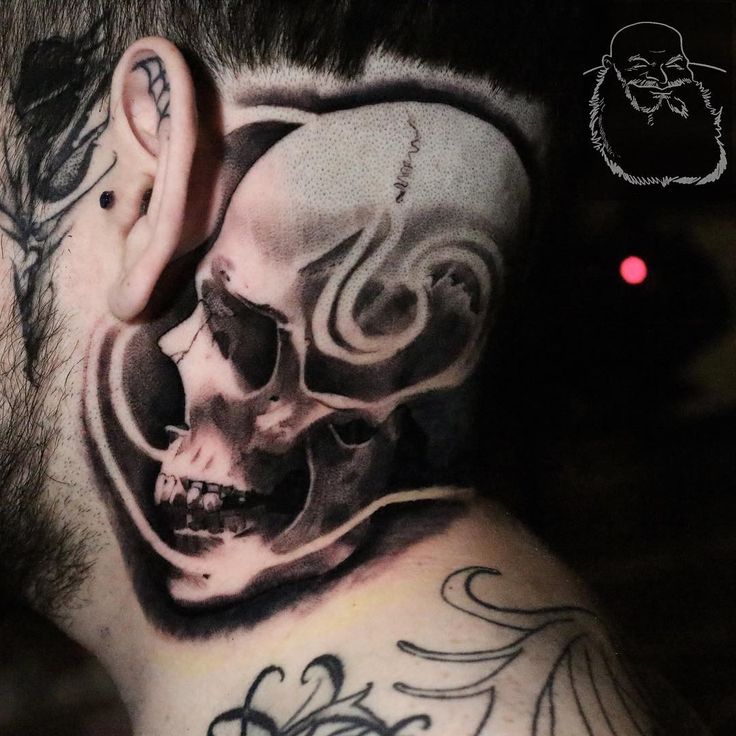 a man with a skull tattoo on his neck