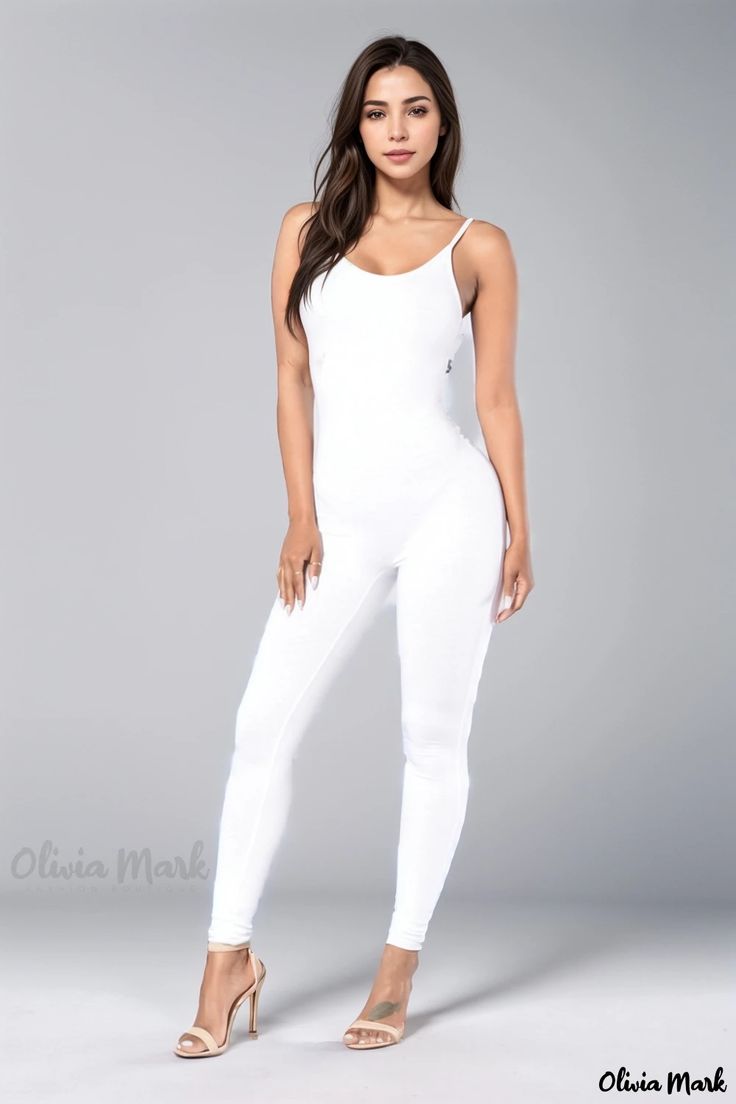 Olivia Mark - Chic and Alluring Backless Jumpsuit Bodysuit with a Fitted Silhouette White Stretch One-piece Bodysuit, White Sleeveless Seamless Bodysuit, White Seamless One-piece Bodysuit, Seamless White One-piece Bodysuit, White One-piece Bodysuit With Built-in Bra, White Stretch Bodysuit For Workout, Stretch White Bodysuit For Workout, White Stretch Bodysuit For Loungewear, White Sleeveless Bodysuit For Loungewear