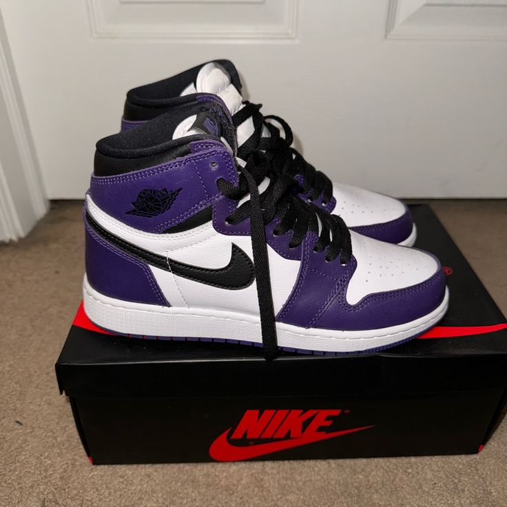 Nike Air Jordan 1 High. Purple/Black Size 6 Youth Nike High-top Purple Basketball Shoes, Nike Purple High-top Basketball Shoes, Purple High-top Sneakers With Cushioned Footbed For Sports, Purple Lace-up Jordan Shoes For Streetwear, Purple High-top Sneakers For Sports, Purple High-top Sneakers With Branded Insole, Purple Round Toe Skate Shoes For Sports, Purple High-top Sneakers With Cushioned Footbed For Streetwear, Casual Purple Jordan Shoes For Streetwear