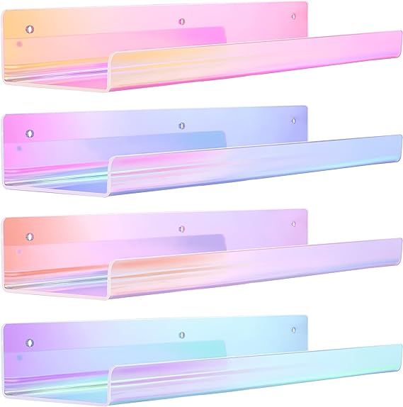 three pastel colored plastic shelfs on white background