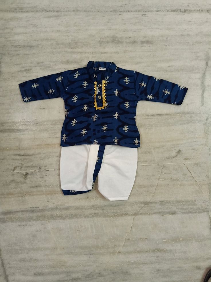 This traditional Royal Blue Rayon Kurta and Cotton Dhoti  Dress will surely add charm to your cute boy. SALES PACKAGE- 1 Kurta, 1 Dhoti FABRIC-   Rayon - Soft Cloth for baby.  OTHER DETAILS-  It has a soft elastic belt for convenient fitting on the waist.                                    Delivery time ranges between 11 - 18 working days. we provide a Express Shipping Also 5-7 days with Extra charge, You may choose in shipping Option. * You May Conversation With Me if You have any doubt. Thank you so much to visit my shop. Rajesh Bansal owner of Rajasthani Dresses Eid Cotton Sets With Motifs, Cotton Sets With Motifs For Eid, Indigo Block Print Sets For Diwali, Cotton Sets With Motifs For Diwali, Traditional Indigo Sets For Festivals, Blue Straight Kurta Set For Diwali, Blue Block Print Sets For Eid, Blue Bollywood Style Block Print Sets, Blue Bollywood Block Print Sets