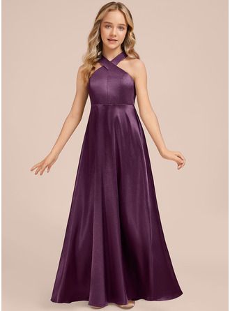 a woman in a long purple dress