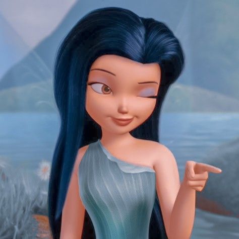 a cartoon girl with long blue hair pointing to the side and wearing a green dress