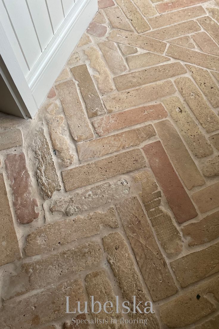 an image of a stone floor that looks like it is made out of wood and bricks