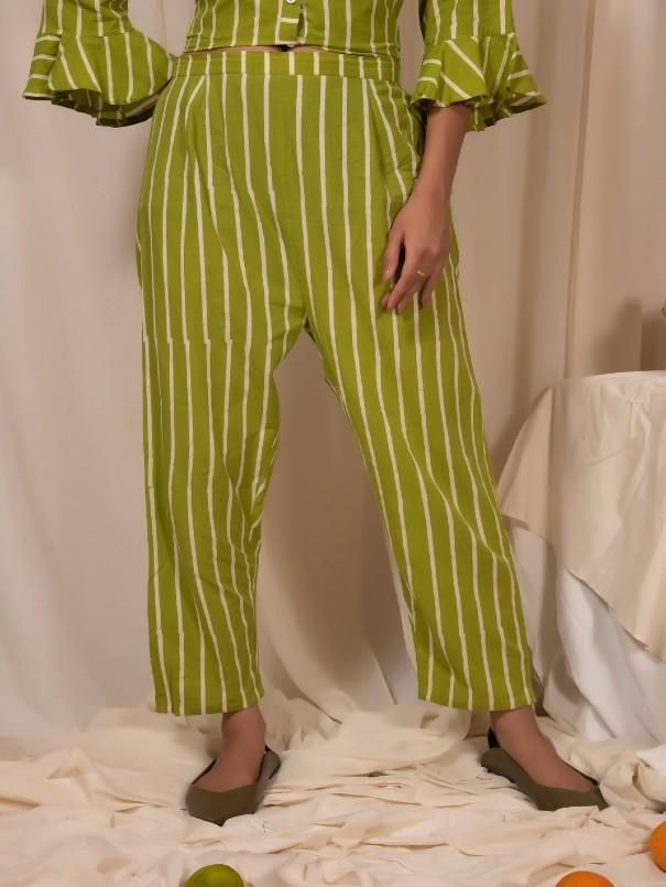 Lime Green Cotton Striped Pants By Silai now available at Trendroots Wide Leg Cotton Bottoms With Vertical Stripes, Striped Straight Pants With Elastic Waistband, Striped Trousers With Elastic Waistband, Straight Striped Pants With Elastic Waistband, Striped Straight Leg Pants With Elastic Waistband, Relaxed Fit Striped Trousers, Striped Cotton Wide Leg Bottoms, Striped Wide Leg Cotton Bottoms, Relaxed Fit Straight Pants With Vertical Stripes