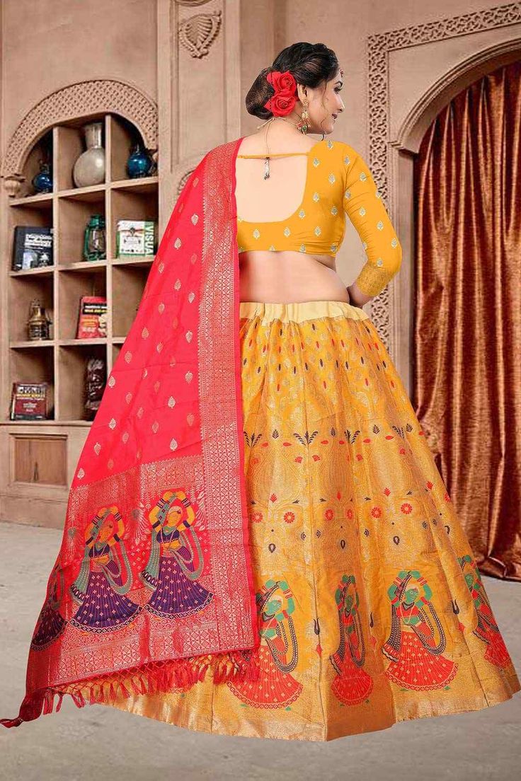 color-yellow, fabric-jacquard, work-woven, brand-name-krupali-savani,occasion-festivewear, occasion-wedding-guest, womenswear,ideal-for-women, lehengas, Product Features: Color: Yellow Lehenga Fabric: Jacquard Choli Fabric: Jacquard Work: Zari Woven Sleeves: 3/4 Sleeves Neck Type: Round Neck Wash Care: Dry Clean Occasion: Festivewear, Wedding Guest Product Type: Lehenga Choli with Dupatta Disclaimer: There will be slight difference in digital to actual image Fitted Brocade Lehenga With Meenakari Details, Fitted Meenakari Sets For Festive Season, Festive Fitted Meenakari Choli, Fitted Banarasi Silk Choli With Meenakari, Traditional Drape Yellow Choli For Eid, Gold Brocade Sets For Traditional Ceremonies, Fitted Traditional Wear With Motifs For Ceremonies, Gold Brocade Dupatta, Festive Jacquard Set With Dupatta