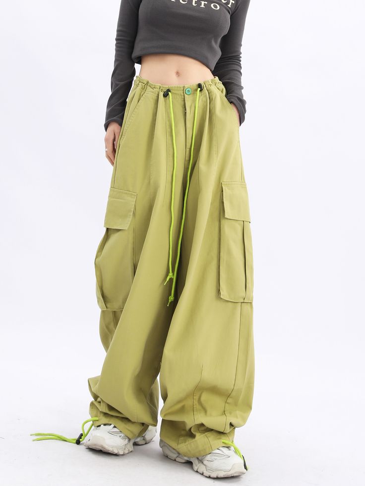 Make a statement with our Acubi Wide Leg Baggy Cargo Pants. These Y2K streetwear essentials boast a relaxed fit, drawstring waist, and plenty of pockets, offering a perfect fusion of style and urban fashion. Green Cargo Style Wide-leg Parachute Pants, Wide Leg Cargo Jeans With Side Pockets For Outdoor, Relaxed Fit Cargo Jeans For Spring Outdoor, Cotton Drawstring Full-length Pants, Spring Relaxed Fit Cargo Jeans For Outdoor, Full Length Cotton Pants With Drawstring, Spring Outdoor Relaxed Fit Cargo Jeans, Baggy Hip Hop Cargo Jeans For Outdoor, Hip Hop Style Baggy Cargo Jeans For Outdoor