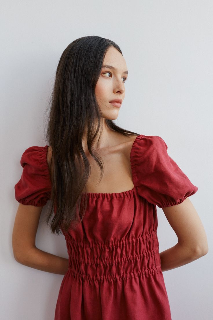 "HOLIDAY is an elegant puff short sleeve linen midi dress.  DETAILS - Puff short sleeve - Elasticated body - Midi length - Oeko-Tex certified 100% local washed midweight linen - Cut and sewn to order just for you in our studio COLOR - Raspberry, you can also choose other colors above - Fabric samples are available here https://www.etsy.com/listing/586569696/linen-fabric-samples SIZING & FIT - Fit true to size - Model is 5'9.5\" / 177cm and wearing a size XS CARE FOR LINEN - Machine wash up to 30ºC/86ºF gentle cycle - Lay flat to dry or tumble dry low - Warm iron if needed - Do not bleach SIZE GUIDE Size conversion guide Size XS (US 0-2, IT 36-38, UK 4-6, Japan 3-5, France 32-34) Size S (US 4-6, IT 40-42, UK 8-10, Japan 7-9, France 36-38) Size M (US 8-10, IT 44-46, UK 12-14, Japan 11-13, Fr Cotton Puff Sleeve Top For Brunch, Short Sleeve Puff Sleeve Top For Daywear, Ruched Puff Sleeve Top For Day Out, Summer Short Sleeve Puff Top, Short Sleeve Puff Sleeve Dress For Day Out, Summer Puff Sleeve Top For Daywear, Short Sleeve Puff Top For Summer Daywear, Summer Puff Sleeve Top With Short Sleeves For Daywear, Summer Puff Sleeve Top With Smocked Bodice