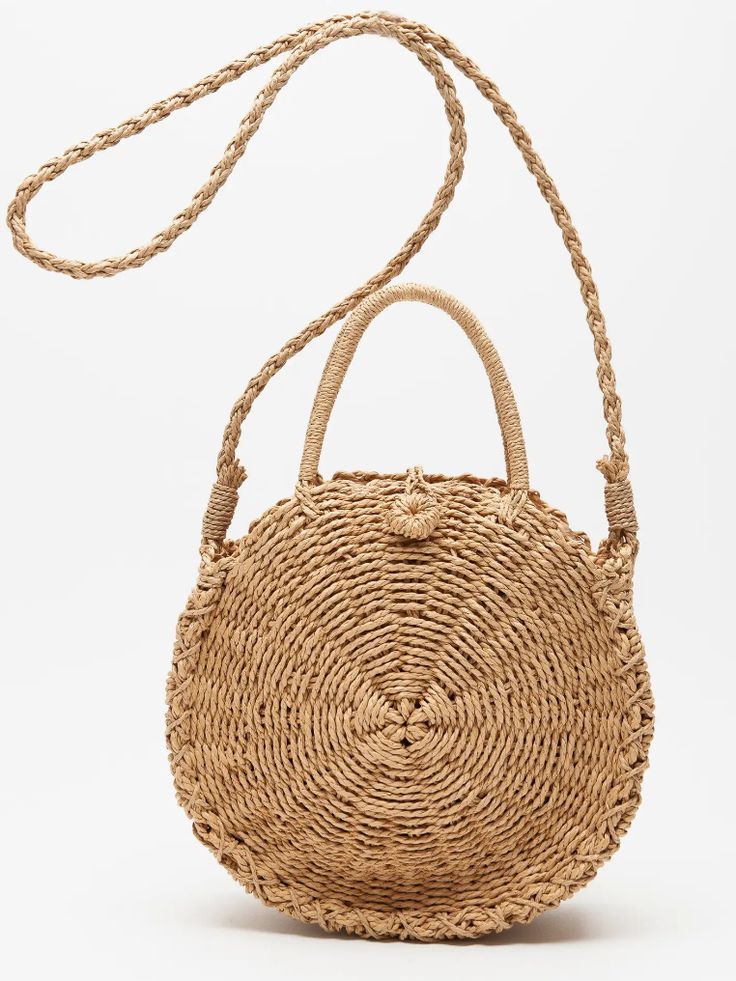 Elevate Your Summer Style with the Morgan Rattan Round Bag! 🌞✨ Fit: This versatile bag features a spacious interior with a secure button closure, perfect for carrying your essentials in style. Features: Crafted from durable, eco-friendly materials, it comes with both top handles and a crossbody strap for multiple carrying options. Why We Love It: Its classic design and neutral colors make it the ideal accessory for any summer outfit, seamlessly blending fashion and function. Colors: Tan & Ivory Eco-friendly Beige Satchel Bag, Versatile Bags With Adjustable Strap And Round Handle, Everyday Bag With Adjustable Strap And Round Handle, Eco-friendly Beige Satchel Shoulder Bag, Eco-friendly Beige Shoulder Satchel, Bag With Adjustable Strap And Round Handle For Everyday, Versatile Brown Bag With Round Handle, Versatile Shoulder Bag With Round Handle And Adjustable Strap, Eco-friendly Shoulder Bag With Detachable Handle For Daily Use