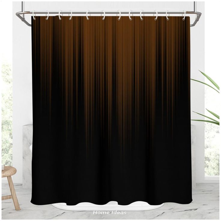 a black and brown shower curtain hanging on a white wall next to a wooden chair