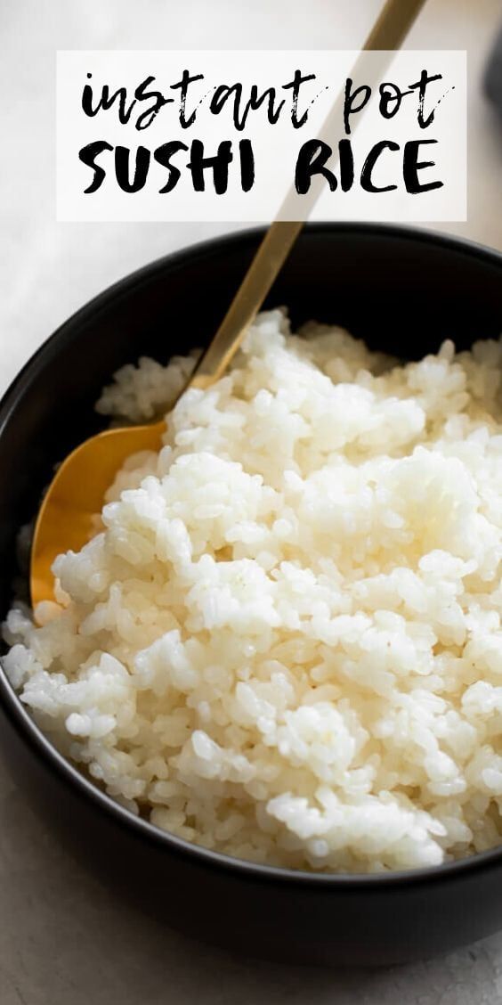 rice in a black bowl with a yellow spoon and the words instant pot sushi rice