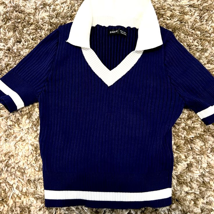 Navy Blue With White Detail, And Fold Down Collar. Sweater Like, Stretch Comfy Top Preppy Navy Tops For Spring, Preppy Navy Top For Spring, Preppy Navy Spring Top, Preppy Blue V-neck Top, Blue V-neck Preppy Tops, Blue Fitted Preppy Tops, Comfy Tops, Collar Sweater, Sweater Top