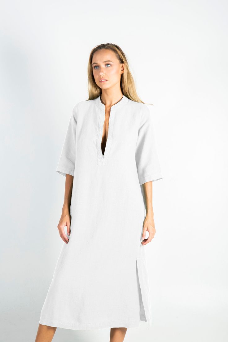 "This carefully tailored women's midi dress is made of cool and light pure linen. It's a stylish outfit for women with distinct taste, for any occasion. NO BUTTONS, NO BUTTONHOLES, NO ZIPS. ZERO SHRINKAGE FITTING: The model appearing in the photo is 176cm (5' 9\") tall and features an S size dress. SMALL Bust (all-around) 111cm/ 43.7\" Waist (all-around) 103cm/ 40.5\" Hips (all-around) 111cm/ 43.7\" Length 120cm/ 47.2\" MEDIUM Bust (all-around) 118cm/ 46.5\" Waist (all-around) 110cm/ 43.5\" Hips Unlined Linen Dress For Daywear, Elegant Linen Tunic Dress, White Unlined Linen Dress, Unlined White Linen Dress, Elegant White Unlined Linen Dress, Elegant Linen Dress For Beach, White Linen Short Sleeve Dress For Work, White Unlined Linen Dress For Daywear, Classic Linen Summer Dress