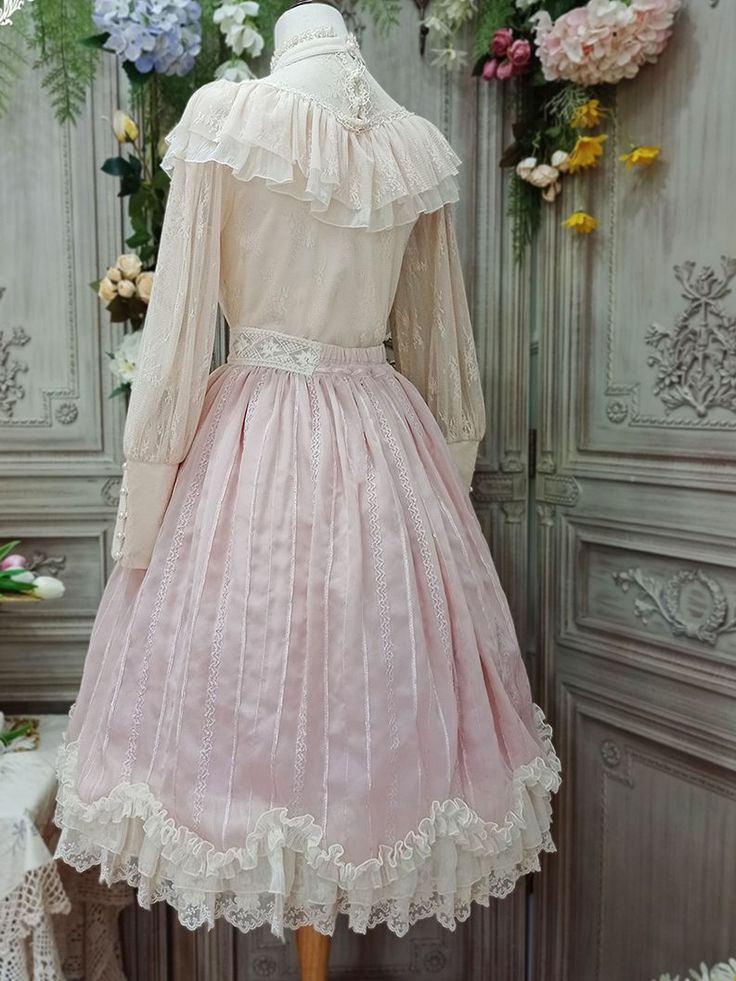 Features: A-line, floral embroidery banded half elastic waist, pretty scalloped ruffle hemline. A petticoat is need to make the skirt as puffy as the pictures.   	 		 			Size 			XS 			S 			M 			L 			XL 			XXL 		 		 			Full Length 			69 			70 			71 			72 			73 			74 		 		 			Waist 			60 			64 			68 			72 			76 			80 Flowy Full Petticoat With Ruffles, Elegant Ruffled Skirt For Garden Party, Pink Feminine Skirt With Lace Trim, Feminine Pink Skirt With Lace Trim, Elegant Pink Skirt With Lace Trim, Pink Ruffled Skirt For Garden Party, Feminine Flared Skirt With Lace Trim, Flared Ruffled Skirt For Garden Party, Flared Ruffle Skirt For Garden Party